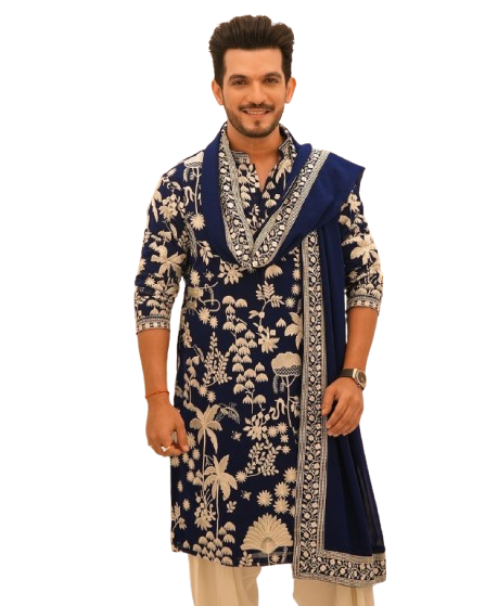 Man wearing an embroidered blue traditional kurta with floral patterns.